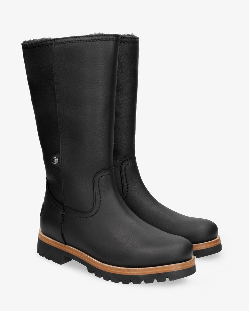 Bambina botas de piel con forro interior de pelo. negro