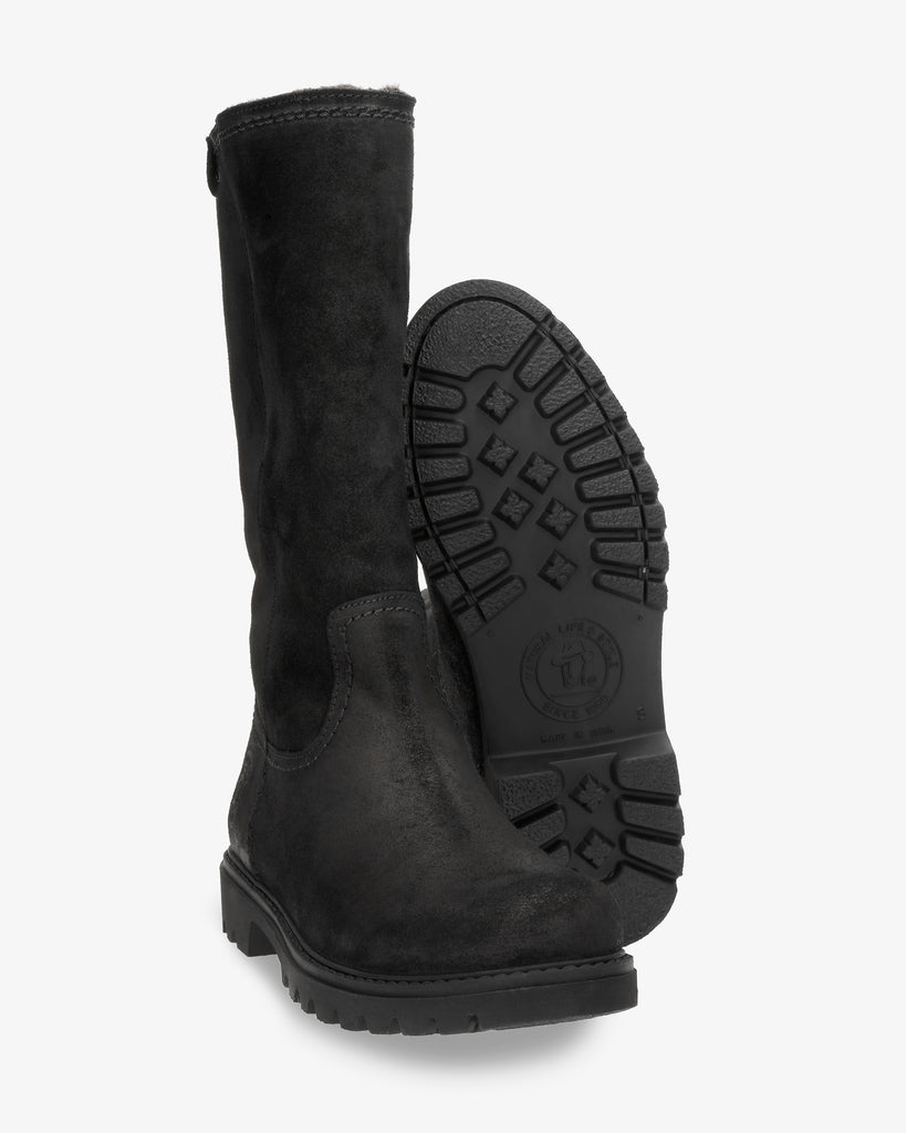 Bambina botas de piel con forro interior de pelo. negro