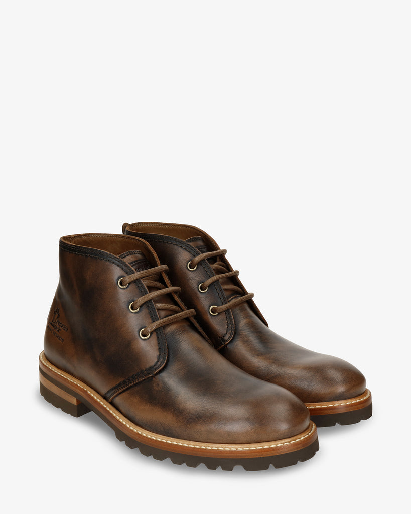 Erick botín de piel con forro interior de piel. cuero