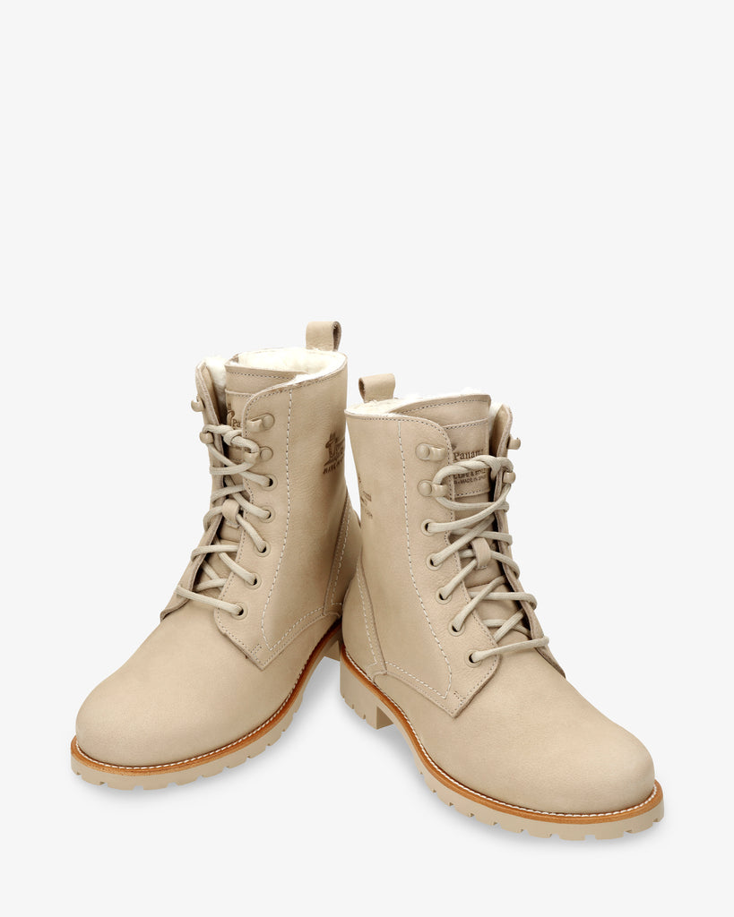 Fara Igloo Trav botas de piel con forro interior de pelo natural. crudo