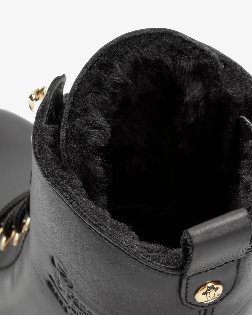 Fara Trav botas de piel con forro interior de pelo. negro