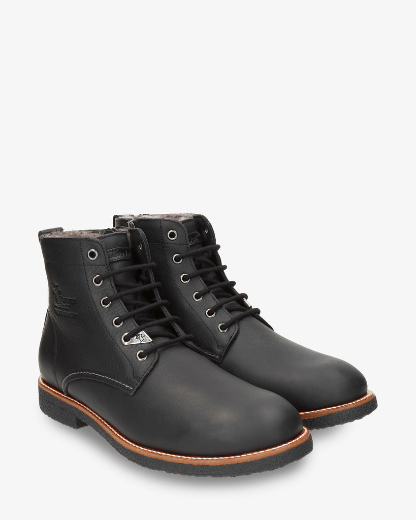 German Igloo botín de piel con forro interior de pelo natural. negro