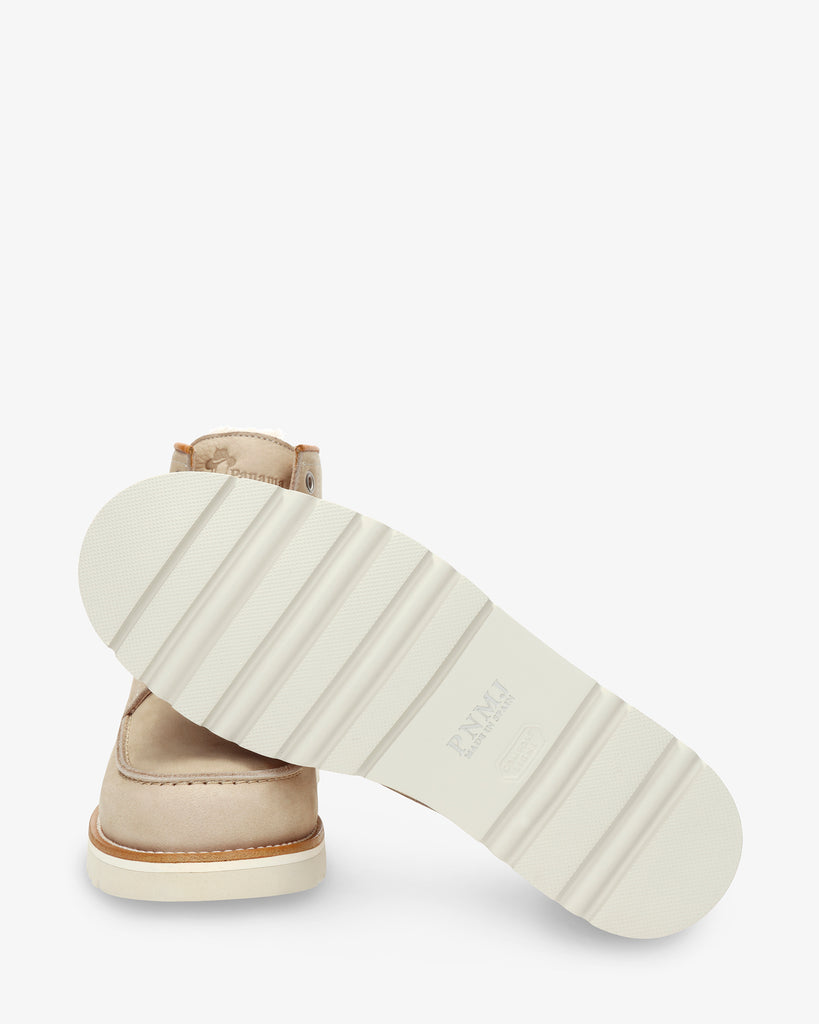 Karen botín de piel con forro interior de pelo. crudo